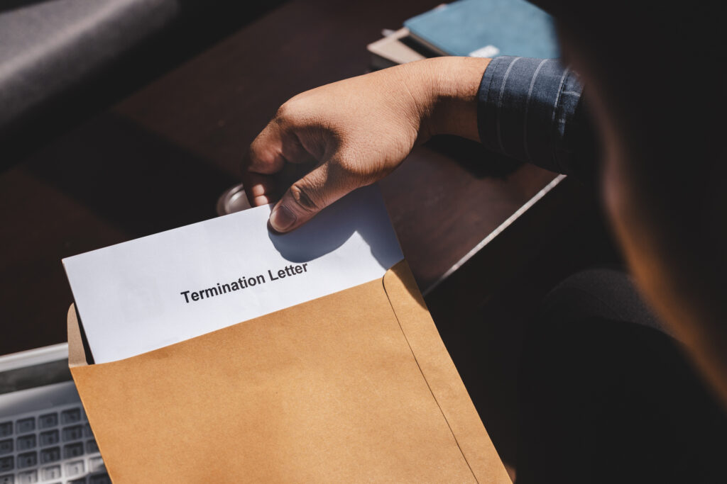 An envelope with a termination letter inside